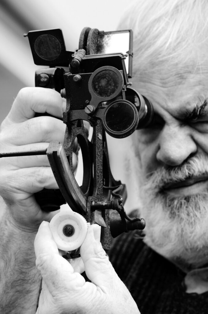 man using a sextant