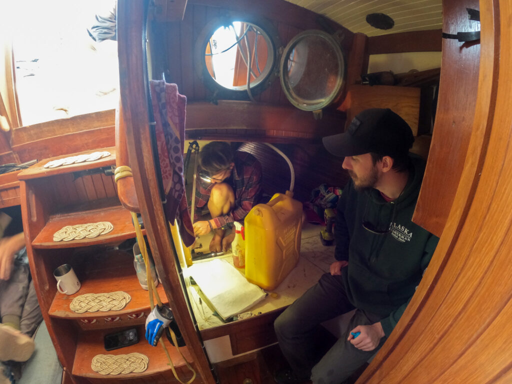 Unclogging a vent hose on a sailboat