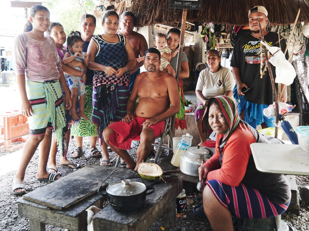 Members getting ready for a family portrait