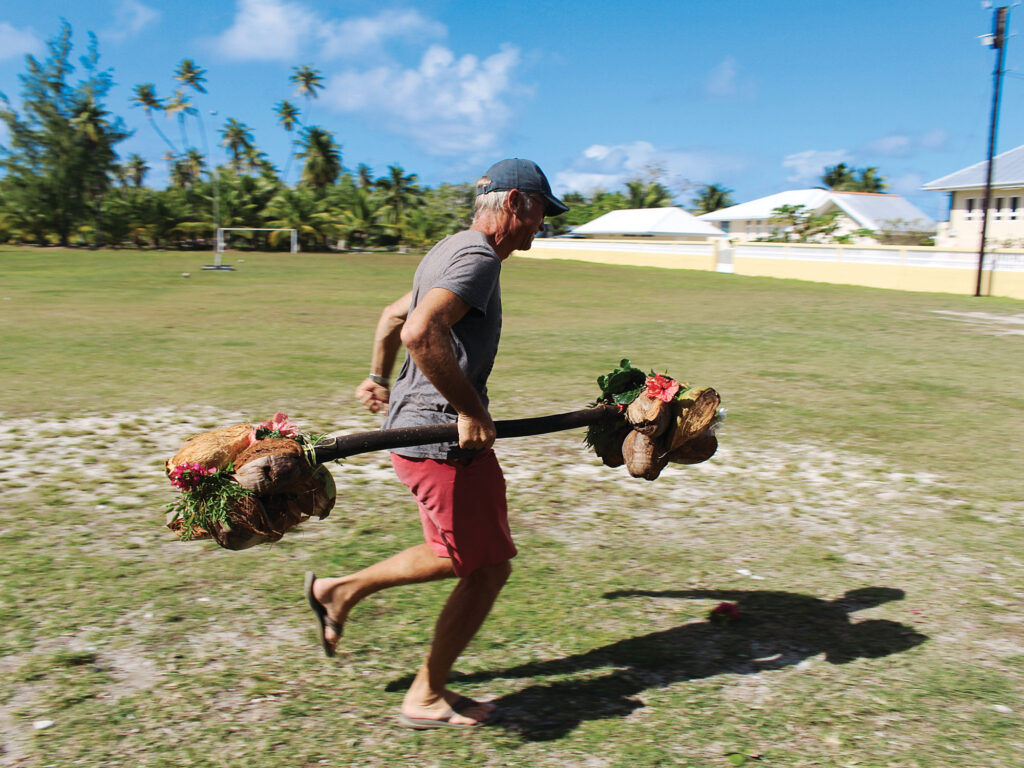 man in fruit-carrying race