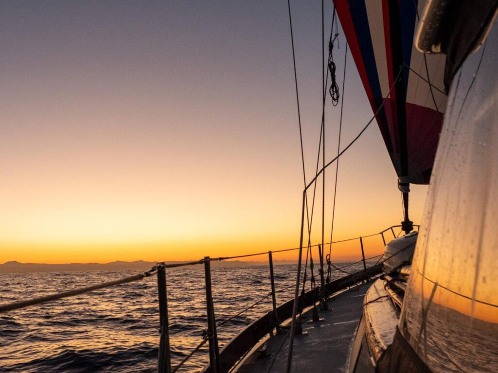 Sailboat off the coast of Mexico at sunset