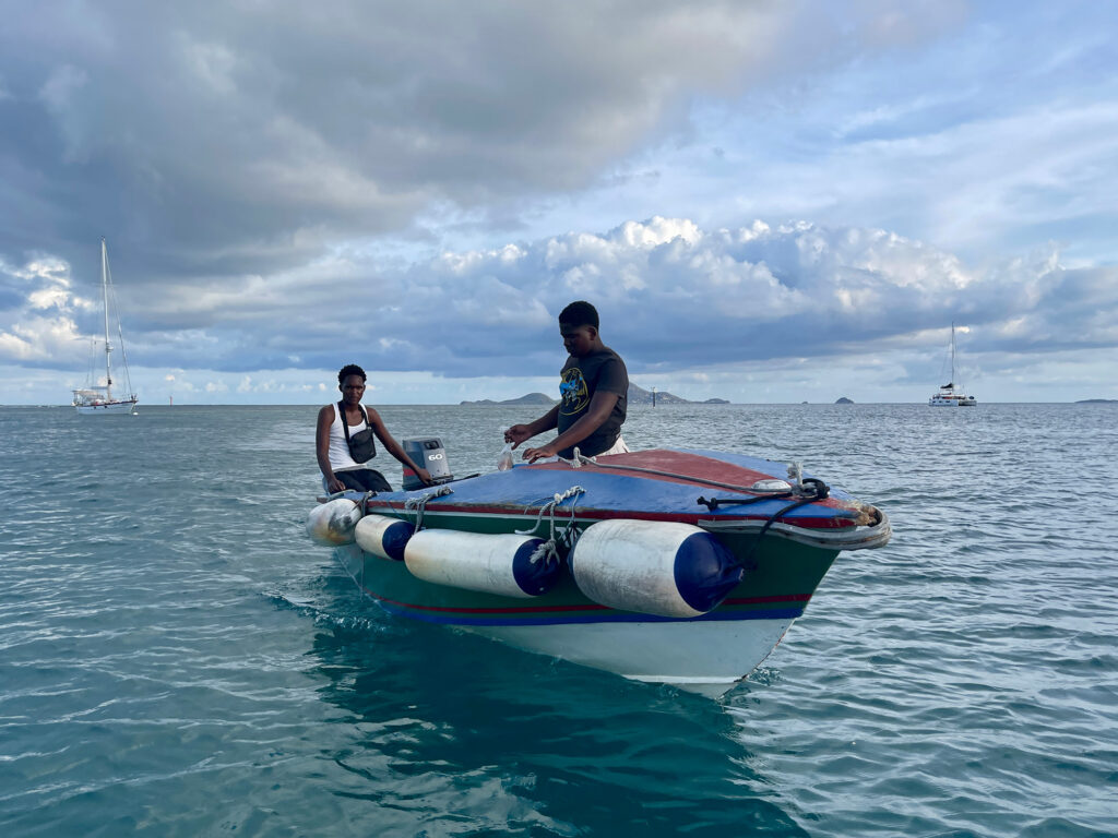 two people on a fishing boat