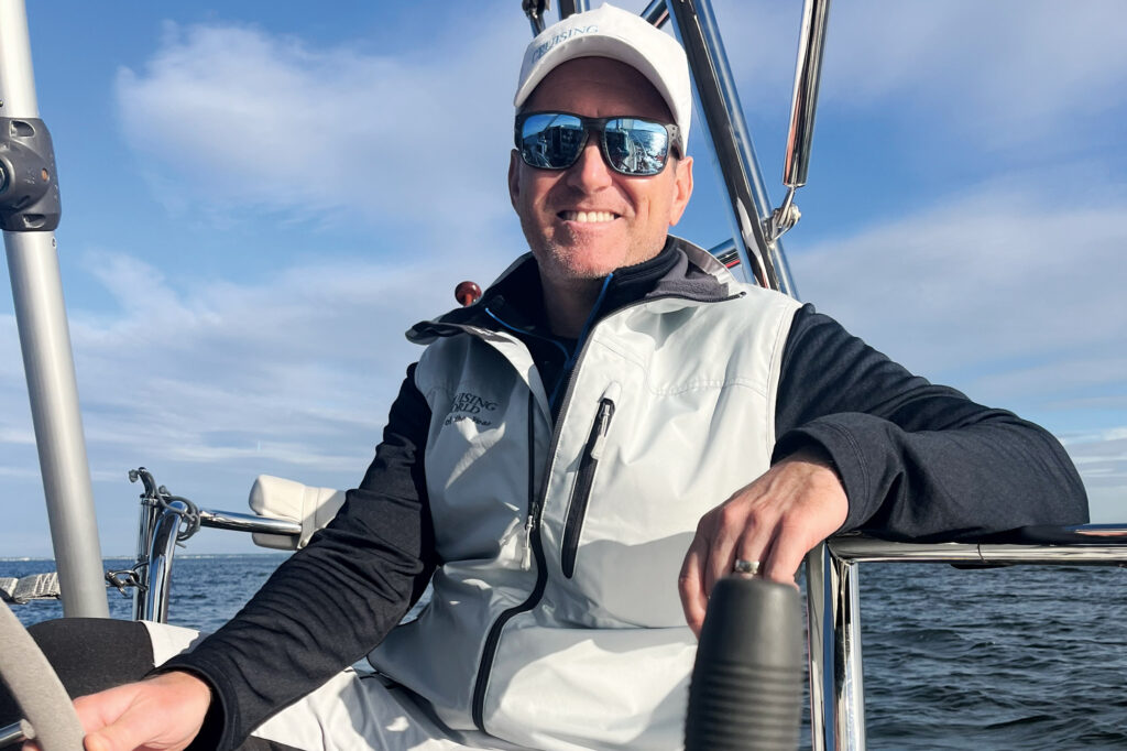 Andrew Parkinson at the helm of a boat