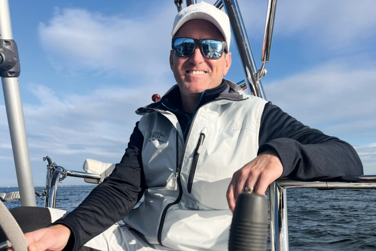 Andrew Parkinson at the helm of a boat