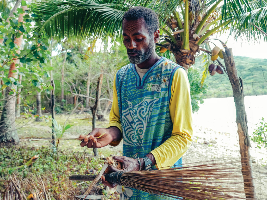 Man making a broom