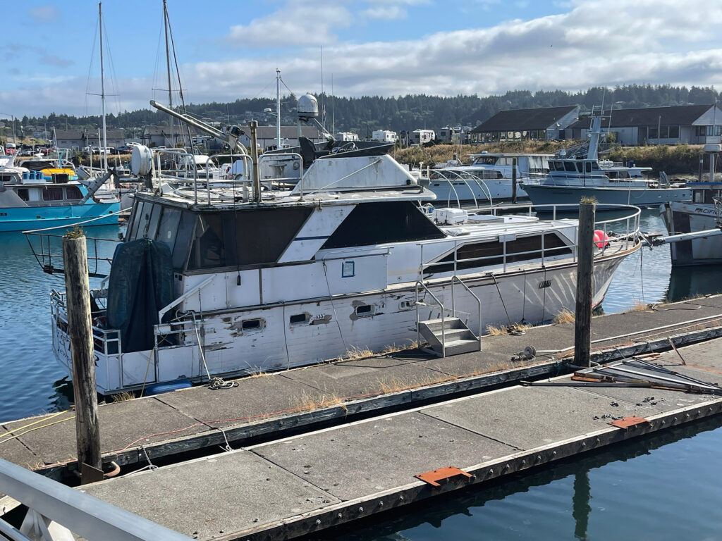 abandoned boat at dock