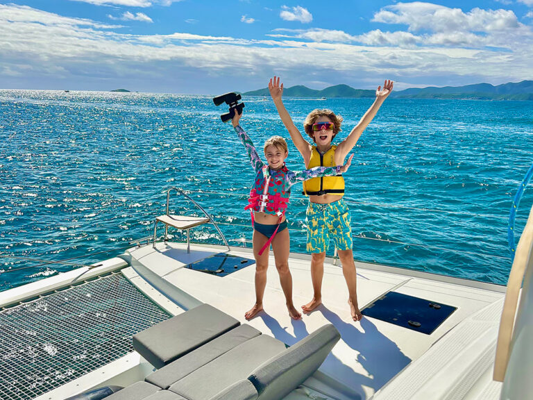 Kids on a catamaran charter